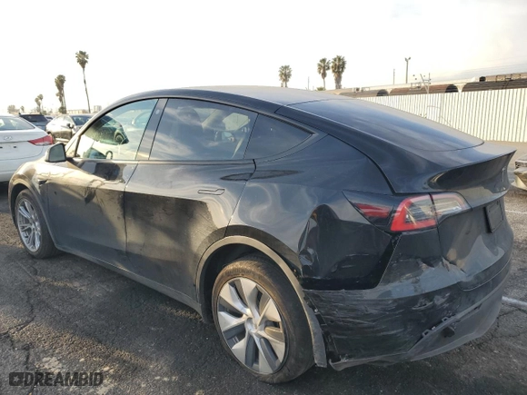2021 Tesla Model Y Long Range with VIN 5YJYGDEE5MF067565, listed as a Copart auction lot 45970585 with 14,684 mi miles and Salvage Title. Bid and sale history available at carsss.com. Image 2.