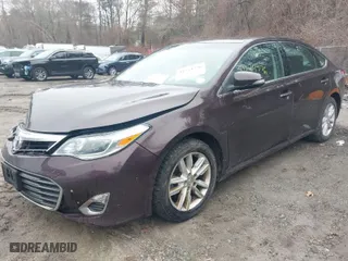2014 Toyota Avalon Limited with VIN 4T1BK1EB9EU133483, listed as a IAAI auction lot 41744776 with 102,987 mi miles. Bid and sale history available at carsss.com. Image 2.