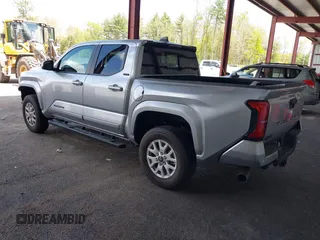 2025 Toyota Tacoma SR with VIN 3TMLB5JN7SM100983, listed as a IAAI auction lot 42220559 with 2,119 mi miles and . Bid and sale history available at DreamBid. Image 3.