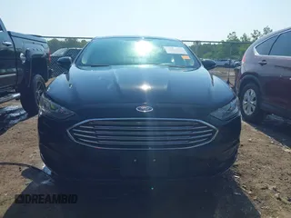 2017 Ford Fusion SE z VIN 3FA6P0H71HR135111, wystawiony jako IAAI lot #42454080 z przebiegiem 120 355 mil mil oraz . Historia ofert i sprzedaży dostępna na DreamBid. Obrazek 12.