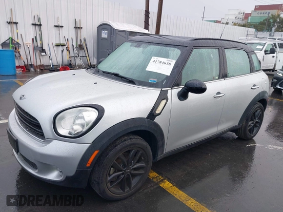 2015 MINI Countryman with VIN WMWZB3C52FWR45805, listed as a IAAI auction lot 41784638 with 41,204 mi miles and . Bid and sale history available at DreamBid. Image 2.