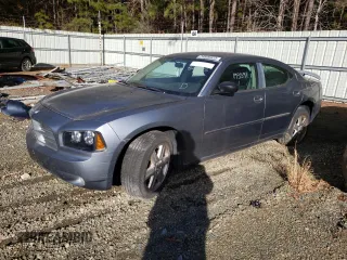 2007 Dodge Charger SXT z VIN 2B3KK43G57H823145, wystawiony jako Copart lot #74926923 z przebiegiem 193 591 mil mil oraz Szkoda całkowita • Salvage title. Historia ofert i sprzedaży dostępna na DreamBid. Obrazek 2.