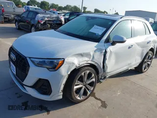 2021 Audi Q3 S line Premium z VIN WA1DECF35M1063868, wystawiony jako IAAI lot #42247128 z przebiegiem 89 959 mil mil oraz . Historia ofert i sprzedaży dostępna na DreamBid. Obrazek 19.