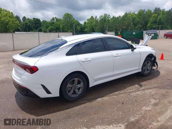 2023 Kia K5 LXS z VIN 5XXG14J2XPG210651, wystawiony jako IAAI lot #42243437 z przebiegiem 37 367 mil mil oraz . Historia ofert i sprzedaży dostępna na DreamBid. Obrazek 4.