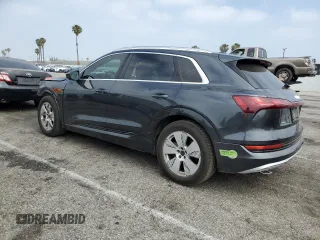 2019 Audi e-tron Premium Plus with VIN WA1LABGE3KB014614, listed as a Copart auction lot 60864165 with 37,718 mi miles and Salvage title. Bid and sale history available at DreamBid. Image 2.