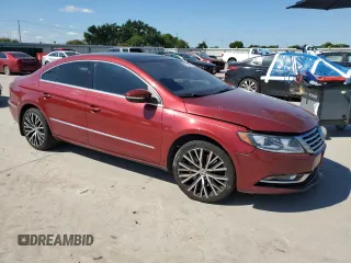 2014 Volkswagen CC Executive with VIN WVWGU7ANXEE526457, listed as a Copart auction lot 55958045 with 118,210 mi miles and Salvage title. Bid and sale history available at DreamBid. Image 4.