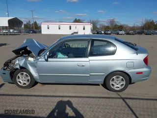 2005 Hyundai Accent GLS with VIN KMHCG35C15U351962, listed as a IAAI auction lot 41824462 with 101,970 mi miles. Bid and sale history available at carsss.com. Image 14.