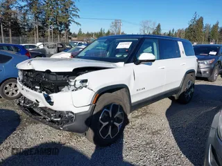 2024 Rivian R1S Adventure with VIN 7PDSGBBA9RN039684, listed as a IAAI auction lot 41558846 with 13,725 mi miles. Bid and sale history available at carsss.com. Image 20.