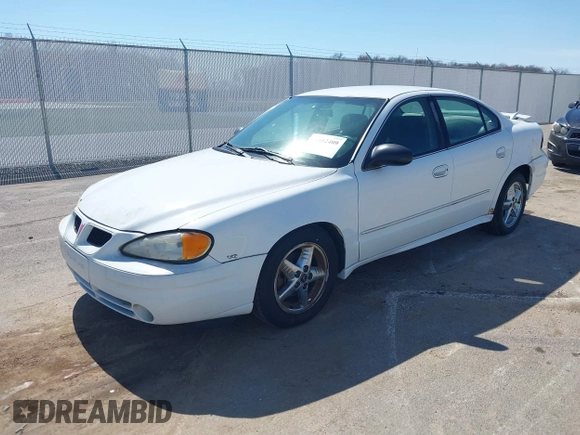 2004 Pontiac Grand Am SE1 with VIN 1G2NF52EX4M594173, listed as a IAAI auction lot 41812409 with 130,793 mi miles. Bid and sale history available at carsss.com. Image 2.