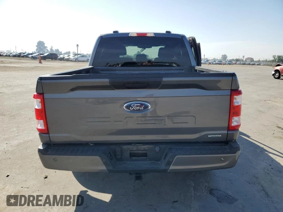 2023 Ford F-150 XL with VIN 1FTEW1CP4PKD21685, listed as a Copart auction lot 54992615 with 27,252 mi miles and Salvage title. Bid and sale history available at DreamBid. Image 6.