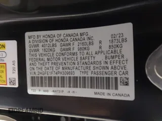 2023 Honda Civic Sedan EX with VIN 2HGFE1F74PH309693, listed as a IAAI auction lot 41783823 with 35,815 mi miles. Bid and sale history available at carsss.com. Image 9.