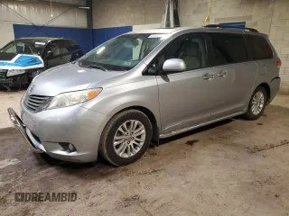 2011 Toyota Sienna XLE AAS with VIN 5TDYK3DC1BS112261, listed as a Copart auction lot 61412735 with 147,084 mi miles and Salvage title. Bid and sale history available at DreamBid. Image 1.