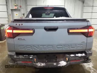 2023 Hyundai Santa Cruz SEL with VIN 5NTJBDAE6PH054563, listed as a Copart auction lot 45035535 with 27,329 mi miles and Salvage title. Bid and sale history available at DreamBid. Image 6.