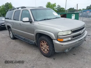 2002 Chevrolet Suburban Z71 z VIN 3GNFK16Z62G267729, wystawiony jako IAAI lot #42364648 z przebiegiem 217 621 mil mil oraz . Historia ofert i sprzedaży dostępna na DreamBid. Obrazek 1.