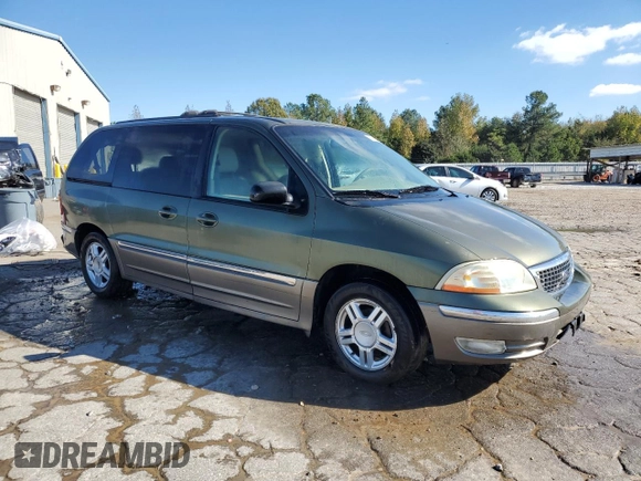 2002 Ford Windstar SEL with VIN 2FMDA53432BB05185, listed as a Copart auction lot 80389234 with 166,397 mi miles and Salvage title. Bid and sale history available at DreamBid. Image 4.