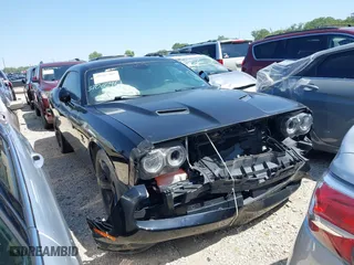 2017 Dodge Challenger R/T with VIN 2C3CDZBT8HH606039, listed as a IAAI auction lot 40267305 with 69,024 mi miles. Bid and sale history available at carsss.com. Image 1.