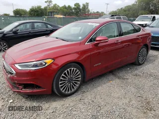 2018 Ford Fusion Titanium with VIN 3FA6P0RU9JR120124, listed as a Copart auction lot 54992384 with 117,170 mi miles and Salvage Title. Bid and sale history available at DreamBid. Image 1.