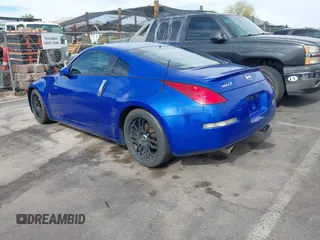 2003 Nissan 350Z Touring with VIN JN1AZ34E23T012447, listed as a IAAI auction lot 41994211 with 180,402 mi miles and . Bid and sale history available at DreamBid. Image 3.