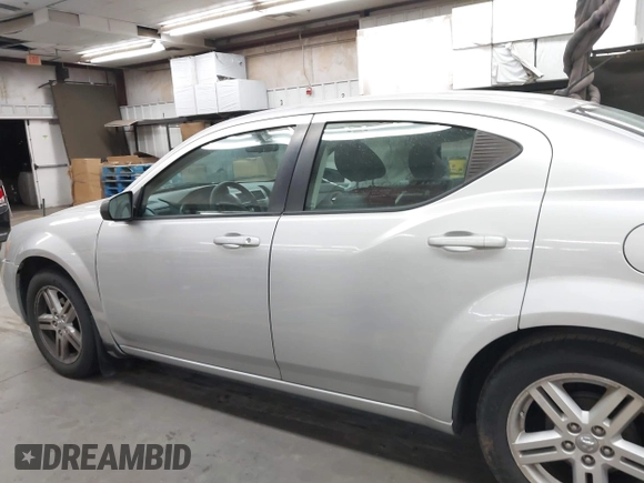 2008 Dodge Avenger SXT with VIN 1B3LC56K88N606043, listed as a IAAI auction lot 42542888 with 88,196 mi miles and . Bid and sale history available at DreamBid. Image 14.