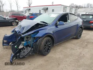 2025 Tesla Model Y Long Range with VIN 7SAYGDED9SF248370, listed as a IAAI auction lot 41336869 with 2,499 mi miles and . Bid and sale history available at DreamBid. Image 18.