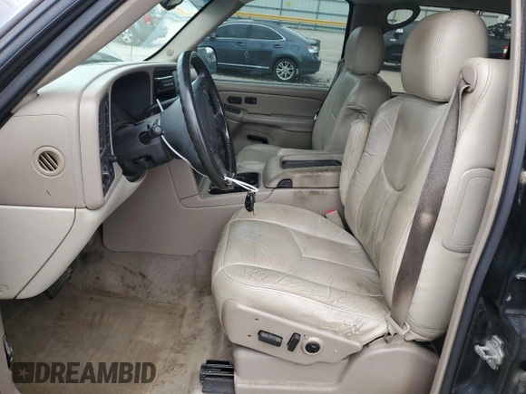2005 Chevrolet Suburban Z71 with VIN 3GNFK16ZX5G111116, listed as a Copart auction lot 48506385 with 302,617 mi miles and Salvage title. Bid and sale history available at DreamBid. Image 7.