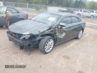 2013 Toyota Avalon XLE with VIN 4T1BK1EBXDU067394, listed as a IAAI auction lot 41944775 with 146,216 mi miles and . Bid and sale history available at DreamBid. Image 2.