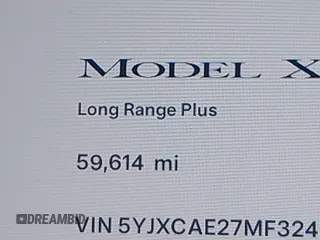2021 Tesla Model X Long Range Plus with VIN 5YJXCAE27MF324270, listed as a IAAI auction lot 41886101 with 59,614 mi miles and . Bid and sale history available at carsss.com. Image 15.