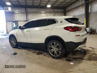 2022 BMW X2 xDrive28i with VIN WBXYJ1C03N5T55985, listed as a Copart auction lot 87183574 with 33,134 mi miles and Salvage Title. Bid and sale history available at carsss.com. Image 2.