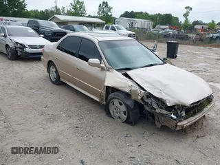 2001 Honda Accord EX z VIN 1HGCG16561A080094, wystawiony jako IAAI lot #42230752 z przebiegiem 246 469 mil mil oraz . Historia ofert i sprzedaży dostępna na DreamBid. Obrazek 1.