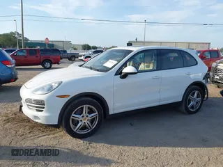 2014 Porsche Cayenne with VIN WP1AA2A23ELA97180, listed as a IAAI auction lot 42072423 with 143,374 mi miles and . Bid and sale history available at DreamBid. Image 15.