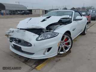 2014 Jaguar XK with VIN SAJWA4EC9EMB52042, listed as a IAAI auction lot 41635233 with 10,566 mi miles. Bid and sale history available at carsss.com. Image 2.