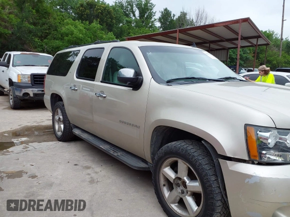 2013 Chevrolet Suburban LT with VIN 1GNSKJE74DR166223, listed as a IAAI auction lot 42172184 with 200,901 mi miles and . Bid and sale history available at DreamBid. Image 13.