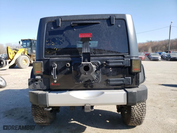 2013 Jeep Wrangler Unlimited Sahara with VIN 1C4BJWEG6DL698827, listed as a Copart auction lot 48284385 with 92,370 mi miles and Salvage Title. Bid and sale history available at carsss.com. Image 6.