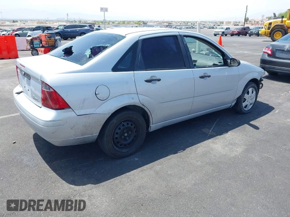 2007 Ford Focus S z VIN 1FAHP34NX7W163158, wystawiony jako IAAI lot #42586421 z przebiegiem 123 131 mil mil oraz . Historia ofert i sprzedaży dostępna na DreamBid. Obrazek 4.