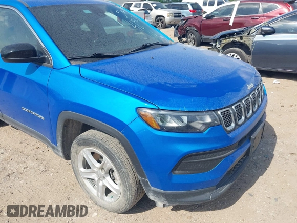 2023 Jeep Compass Sport with VIN 3C4NJDAN1PT509922, listed as a IAAI auction lot 42327048 with 26,598 mi miles and . Bid and sale history available at DreamBid. Image 6.
