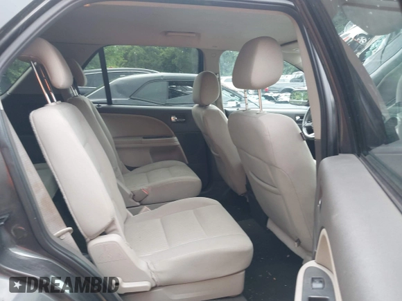 2008 Ford Taurus X SEL z VIN 1FMDK02W78GA05451, wystawiony jako IAAI lot #42772241 z przebiegiem 290 453 mil mil oraz . Historia ofert i sprzedaży dostępna na DreamBid. Obrazek 8.