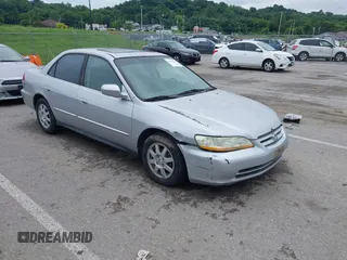 2002 Honda Accord SE z VIN 1HGCG56712A088663, wystawiony jako IAAI lot #42520639 z przebiegiem 2 304 496 mil mil oraz . Historia ofert i sprzedaży dostępna na DreamBid. Obrazek 1.