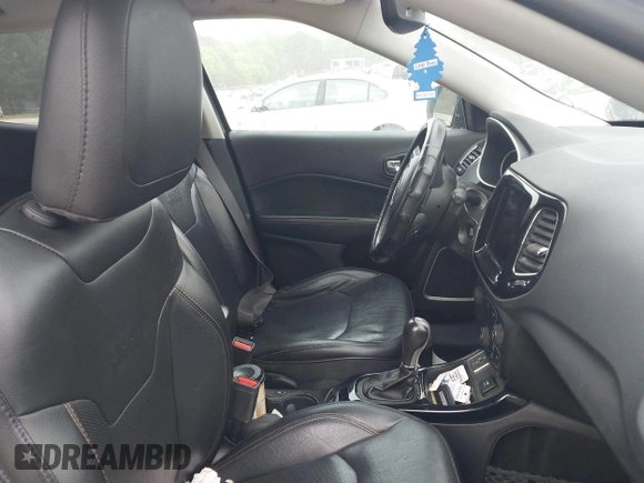 2020 Jeep Compass Limited with VIN 3C4NJCCB0LT128635, listed as a IAAI auction lot 42085121 with 166,511 mi miles and . Bid and sale history available at DreamBid. Image 5.