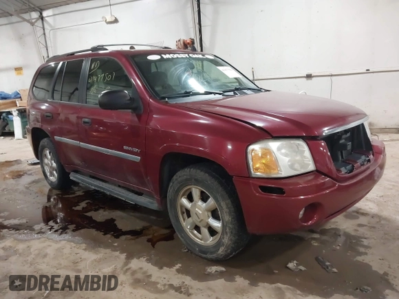 2006 GMC Envoy SLT with VIN 1GKDS13S362135683, listed as a IAAI auction lot 41477501 with 214,760 mi miles. Bid and sale history available at carsss.com. Image 1.