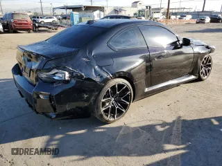 2024 BMW M2 with VIN 3MF13DM06R8E28720, listed as a Copart auction lot 77493254 with 5,913 mi miles and Salvage Title. Bid and sale history available at carsss.com. Image 3.