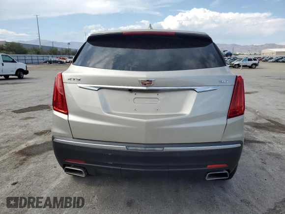 2017 Cadillac XT5 FWD with VIN 1GYKNARSXHZ158528, listed as a Copart auction lot 59761385 with 100,238 mi miles and Salvage title. Bid and sale history available at DreamBid. Image 6.