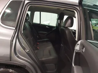 2016 Volkswagen Tiguan SE z VIN WVGBV7AX3GW507850, wystawiony jako IAAI lot #41303866 z przebiegiem 97 989 mil mil oraz . Historia ofert i sprzedaży dostępna na DreamBid. Obrazek 8.