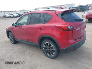 2016 Mazda CX-5 Grand Touring with VIN JM3KE4DY8G0729446, listed as a IAAI auction lot 41871207 with 89,258 mi miles. Bid and sale history available at carsss.com. Image 3.