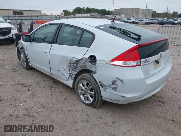 2010 Honda Insight EX with VIN JHMZE2H71AS035091, listed as a IAAI auction lot 41380128 with 181,653 mi miles and . Bid and sale history available at DreamBid. Image 3.