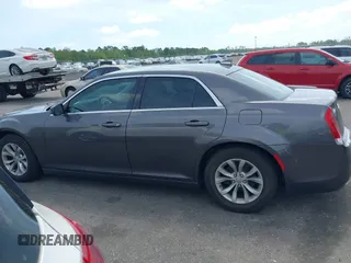 2015 Chrysler 300 Limited with VIN 2C3CCAAG1FH887073, listed as a IAAI auction lot 41967713 with 255,638 mi miles. Bid and sale history available at carsss.com. Image 14.