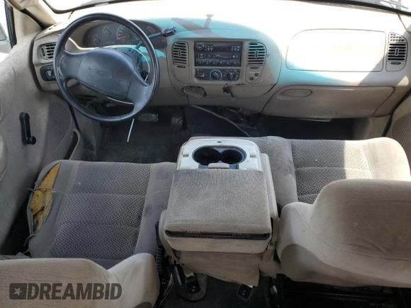2001 Ford F-150 with VIN 1FTPX17L21NA37619, listed as a Copart auction lot 56922485 with 212,148 mi miles and Salvage title. Bid and sale history available at DreamBid. Image 8.
