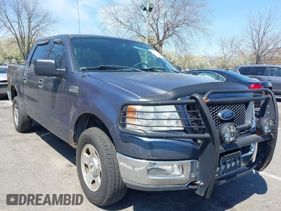 2004 Ford F-150 XLT with VIN 1FTRW14W24KA27415, listed as a IAAI auction lot 42081888 with 149,897 mi miles. Bid and sale history available at carsss.com. Image 1.
