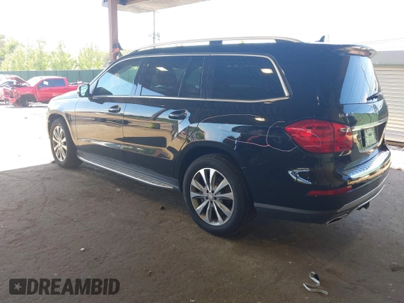 2014 Mercedes-Benz GL 450 z VIN 4JGDF7CE7EA395551, wystawiony jako IAAI lot #42247332 z przebiegiem 105 636 mil mil oraz . Historia ofert i sprzedaży dostępna na DreamBid. Obrazek 3.