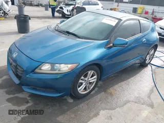 2012 Honda CR-Z with VIN JHMZF1D45CS004237, listed as a IAAI auction lot 42598638 with 60,896 mi miles and . Bid and sale history available at DreamBid. Image 2.