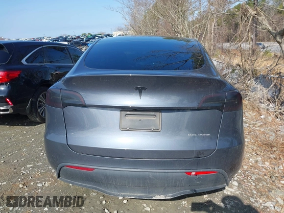 2023 Tesla Model Y Long Range with VIN 7SAYGDEE1PA053215, listed as a IAAI auction lot 41476973 with 58,025 mi miles and . Bid and sale history available at DreamBid. Image 15.